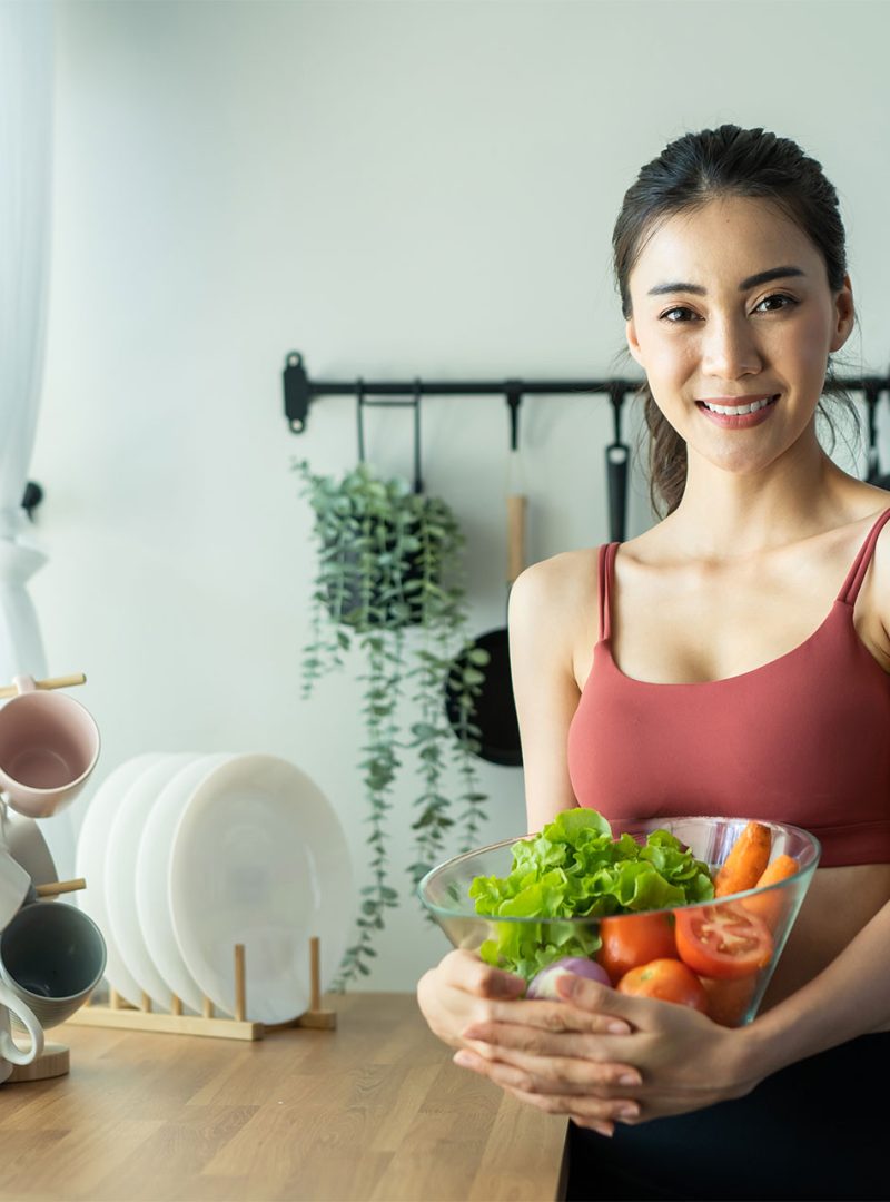 asian-attractive-sport-woman-holding-salad-bowl-an-2021-12-09-15-16-10-XJ3SGYZ.jpg